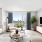 Living room with couch, coffee table and TV on console