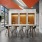 Resident lounge and co working space at our apartments for rent in Somerville, featuring a conference table with chairs.